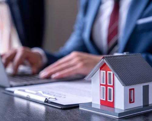 Businessman printing contract documents for purchase and home insurance home insurance concept, home