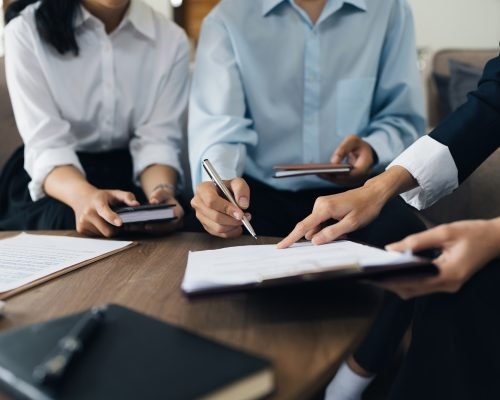 Young couple consultations with a insurance agent. saving and insurance concept